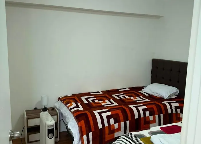 One Partment Facing A Park In * Cusco